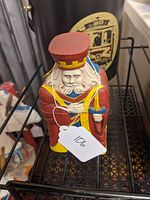 Front view of the card case showing the king side with a red crown and regal attire.