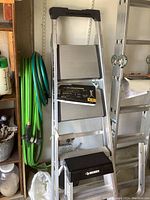 Gorilla and Husky ladders side by side, showing general condition and size