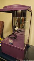 Purple Classy Wrap balloon gift machine front and side view including power cord