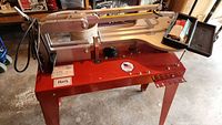 Red RBI Hawk Precision Scroll Saw on metal stand