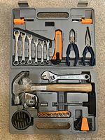 Photo shows Ohio Forge travel tool set containing various hand tools arranged neatly in carrying case.