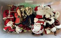 Bin with assorted Santa and angel figurines