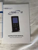 Instruction manual for the InTENsity 12 pain reliever device published by Compass Health with website www.roscoemedical.com.