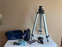 Overall kit showing telescope head, tripod, carry bag and accessories
