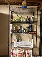 Overview photo showing all shelves with various home maintenance supplies and tools