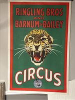 Large green and red vintage circus poster with leopard depicting Ringling Bros and Barnum & Bailey Circus.