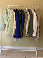 Rack view showing all ten Zara jackets hung side by side