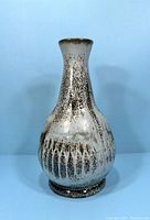 Front view of vintage Blue Mountain Pottery slate glazed bottle/vase