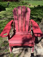 Front view showing slatted seat and high back