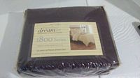 Packaged Dream Bedding Collection 1800 Series queen 6-piece sheet set in purple, showing front label with product details and bedroom image.