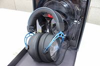 HyperX Cloud Alpha S gaming headset in original box with memory foam cushions and blue metal framing.