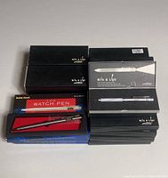 Lot of 21 pens including Coast Write & Light boxed pens and Radio Shack LCD Watch Pen.