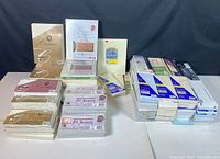 Close view of stationery and envelopes showing packaging and brand details.