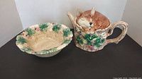 Photo showing the fox teapot and matching pine and berry decorated bowl