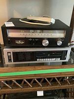 Front view of both Sears Professional Series stereo tuner and LXI Series integrated stereo amplifier stacked, showing controls and indicators.