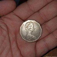 Front side of 1970 Australian 50 Cent Coin showing Queen Elizabeth II profile and inscriptions.