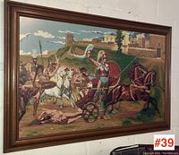 Full front view of the large framed needlework showing the complete scene mounted on a wall.