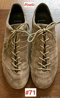Top view of the pair of Pirelli men's shoes showing light brown suede material, curved stitch pattern, and lace-up closure.