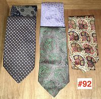 Photo of three silk ties in different patterns and colors.