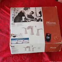 Photo of Pfister Brea bathroom faucet box showing product image, brand name, and features such as Push & Seal technology and widespread 8-20 inch design.