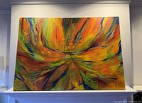 Full frontal view of the abstract oil painting mounted above a mantel