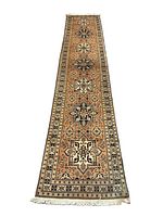 Full length view of runner on white background showing overall pattern, color and fringes