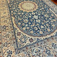 Close-up of central medallion and surrounding arabesque pattern