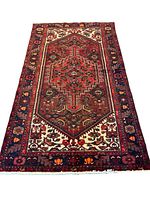 Full frontal view of rug laid flat on white background showing full pattern