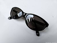 Black framed Maui Jim sunglasses from front angle showing lens shape and frame style