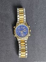 Full view of Lorenz men's chronograph watch with two-tone metal band on black background