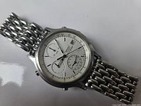 Front view showing watch dial, case and bracelet