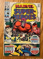 Front cover of Marvel Super-Heroes issue #23 comic book showing Magneto and other characters, with text for stories including Daredevil vs Owl and the Watcher.