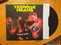 Front cover of Teenage Heads Tornado vinyl record album showing band image and title