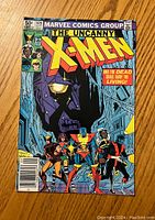 Front cover showing The Uncanny X-Men #149 with primary X-Men characters and comic price at 50 cents.