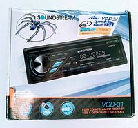 Box photo showing Soundstream logo, product image and features including USB, AUX input, 1-DIN size, CD/MP3 playback, and detachable faceplate.