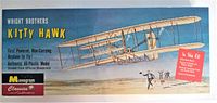 Full top view of the box showing the Wright Brothers Kitty Hawk airplane illustration and branding.