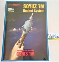 Front box cover showing Soyuz TM model artwork and scale information.