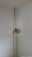 Full view of hanging swag lamp including chain length
