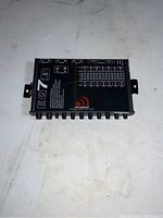 Top view of the Massive Audio EQ7 Equalizer showing model name and branding