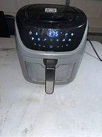 Front view of Power XL air fryer showing the digital control panel with temperature and timer display