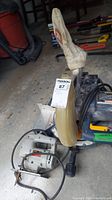 Photo of the Skil jig saw showing overall condition with attached price tag and cord.