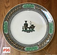 Full view of the 19th century transferware plate showing central urn motif and detailed border pattern.