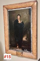 Full view of framed oil painting showing overall condition and plaque