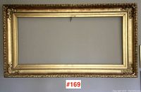 Full front view of the rectangular gold leaf frame