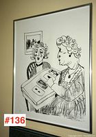 Full image of the framed print showing two women at a table engaged in fortune telling.