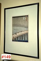 Full view of framed print hanging on wall