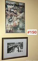 Framed Shaw Festival 1980 poster and framed black-and-white photograph displayed on wall