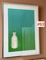 Overall view of framed print against wall