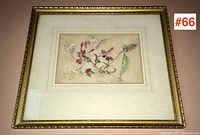 Framed watercolor floral artwork with gold ornate frame hung on wall, showing entire lot.