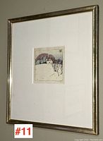 Full view of the framed print showing silver metal frame, white mat, and centered artwork.